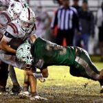 High school football teams prepare for the 2026 season.